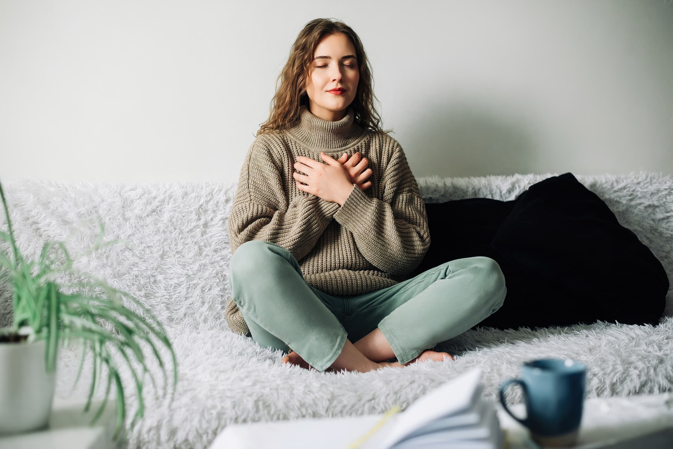 Woman practicing relaxation techniques and deep breathing exercises