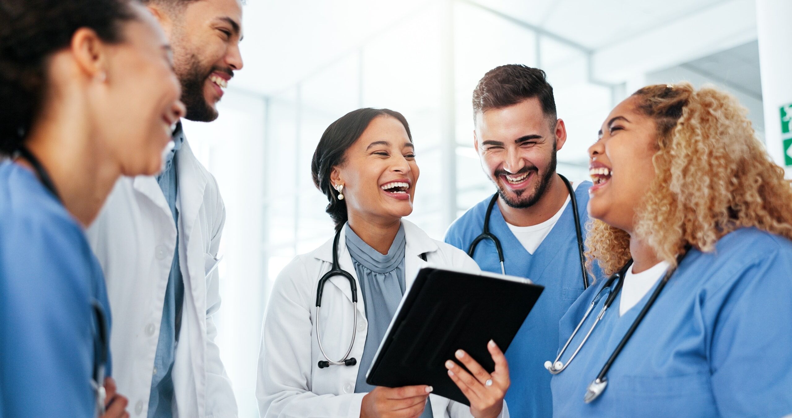 Group of medical professionals laughing together